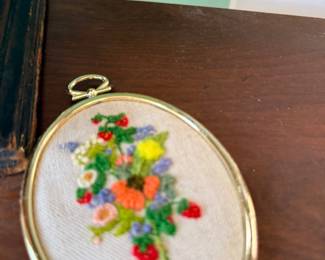 Framed oval embroidered floral needlework