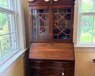 Mahogany broken-pediment secretary desk with glass bookcase top