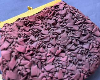 Mauve woven clutch purse