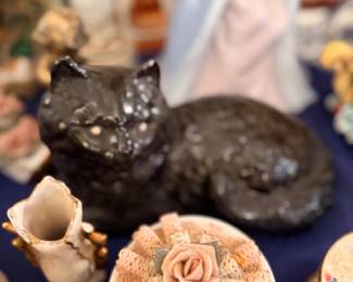 Black ceramic cat figurine and rose-topped box