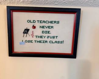 Framed teacher cross-stitch sampler
