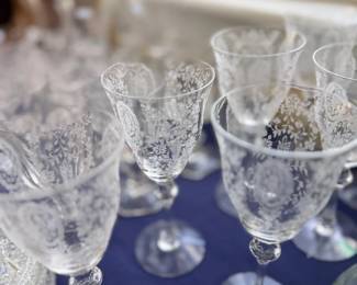 Etched crystal wine stemware with floral pattern
