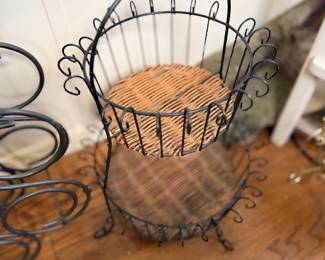 Wrought iron wire basket with wood base
