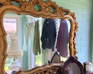 Ornate gold gilt framed wall mirror