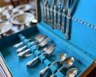 Silver flatware set in fitted blue case