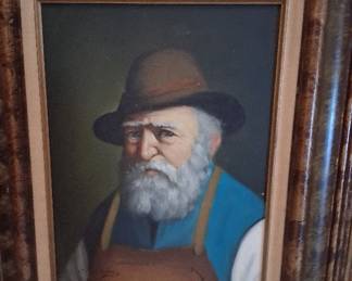 oil painting on canvas of a bearded man in a hat