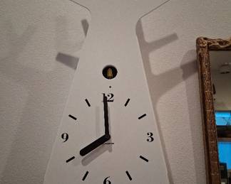 Modern Cuckoo clock white tree with yellow bird and swinging gold pendulum