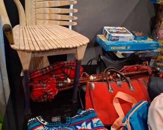 Vintage Coogi Koala knit sweater from Australia; Gerard Rigot hand-painted Swan Chair; Vintage Coach purse; Bagpipes