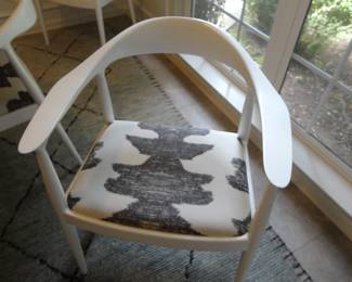 These side chairs provide a design forward both relaxed and supportative