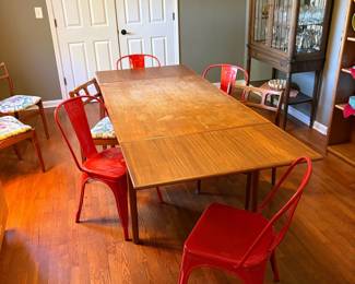 Mid-Century Teak Dining Table with Red Industrial Metal Chairs