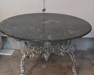 Vintage cast iron base table with green marble top - 42in diameter