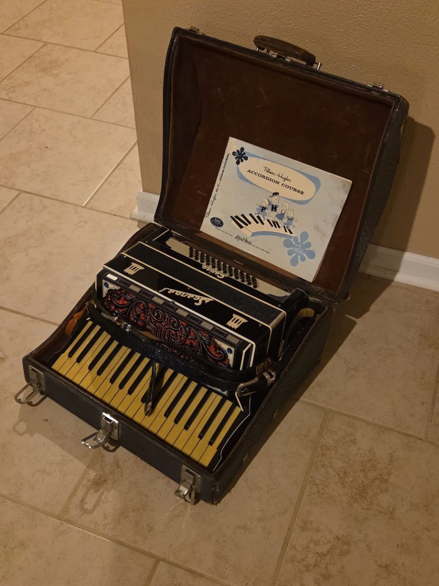 Accordian with Case and Book