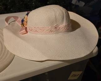 Straw sun hat with floral ribbon