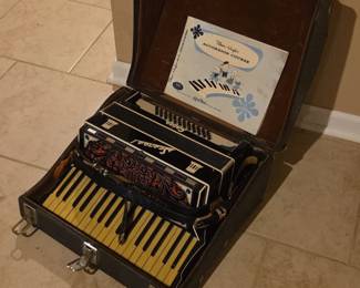 Accordian with Case and Book