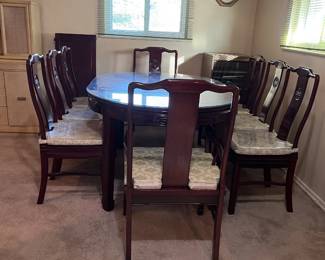 This dining table and chairs are included in the sale, but are physically located at another location.  Ask to speak with David about them.