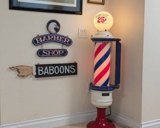 Beautifully restored antque barber's pole - part of a tribute to Dennis "Moto" Suzuki of Wally's Barber Shop in Laguna Beach