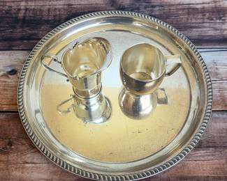 Sterling silver serving tray and creamers, including one piece from Tiffany & Co.
