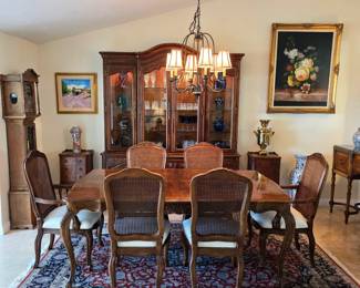 Stunning solid wood dining set, vintage china cabinet, grandmother clock, and original artwork