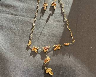 Gold-tone Leaf and Vine Necklace and Earring Set with Brown Crystals