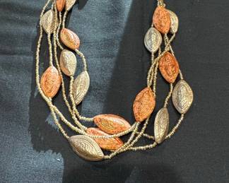 Multi-Strand Necklace with Oval Pendants and Seed Beads