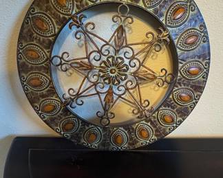 Round Metal Wall Art with Starburst and Fleur-de-lis Design