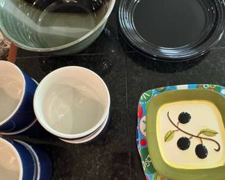 Assorted Ceramic and Glass Tableware including Fiesta, Gibson, and Mikasa