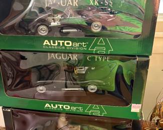 2 Jaguar and one Lotus model cars