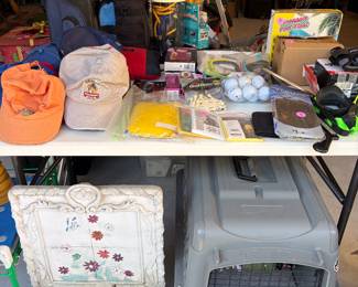 Tools, pet carrier, garden decor