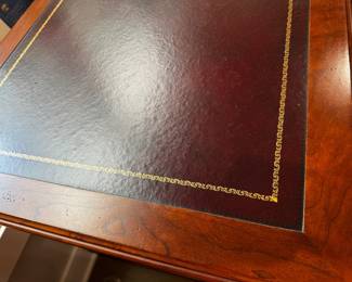 Sligh leather top desk    30"h x 56"w x 26"d 
