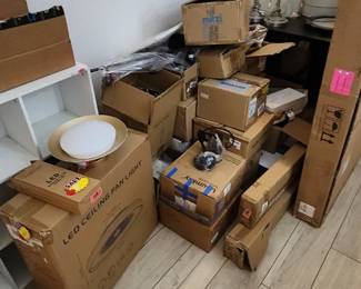 This Pile is in box lighting. ALl types, Wall, chandelier, ceiling, indoor/outdoor We will sort, organize, & price this before the sale!