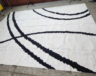 Stirking Blk/Whit area rug washable. Photos show only 25% of the rugs we have!