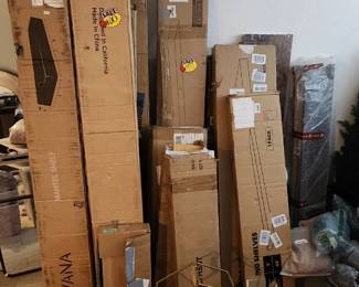 This if the pile of shelving and fireplace mantels, We will sort, organize, & price this before the sale!