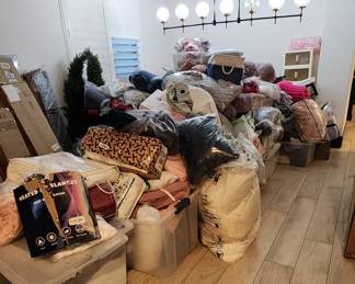 This is a huge pile of bedding, blankets, comforters, etc. We will sort, organize, & price this before the sale!