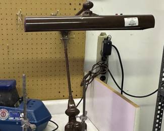 1940s vintage mounted lamp with a brown finish and "floating" adjustable arm