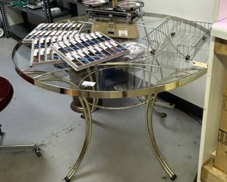 Round brass and glass dining table