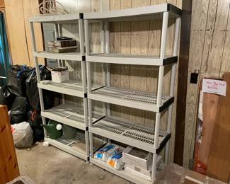 Two Gray Plastic Storage Shelves