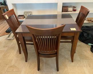Square Table And Three Chairs