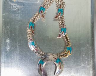 Squash blossom style necklace