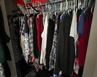 Lots of woman’s clothes. Size large/ X-Large. Name brand. Lots with tags