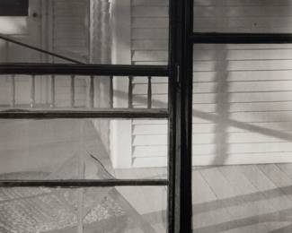 94 John Szarkowski (1925-2007) "Screen Door, Hudson, Wisconsin," 1950 Gelatin silver print on paper From the edition of unknown size; possibly printed in 2005 Signed, titled, and dated in pencil, verso: John Szarkowski / 1950; inscribed "SZ.018.13," in pencil, presumably in another hand, verso Image: 13.25" H x 10.5" W; Sheet: 14" H x 11" W Estimate: $1,000 - $1,500