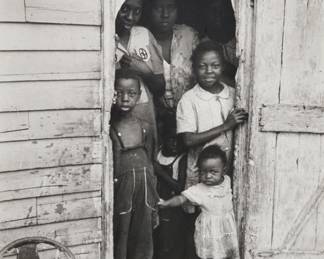 86 Henri Cartier-Bresson (1908-2004) Untitled (family in doorway), New Orleans, circa 1965 Gelatin silver print on paper From the edition of unknown size Appears unsigned Image/Sheet: 9.75" H x 6.625" W Estimate: $3,000 - $5,000