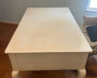 Charming wooden vintage desk with a white painted finish, curved legs, and eight drawers for storage (4 drawers on both sides). Perfect for a home office workspace.
