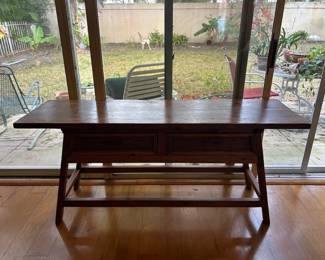 Wooden table with internal storage