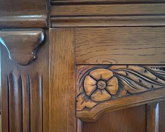 Unique antique coat closet with carved details