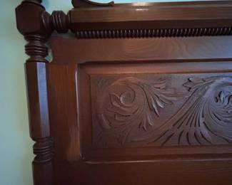 Antique wood bedframe (headboard and footboard). Full sized bed.
