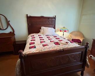 Antique wood bedframe (headboard and footboard). Full sized bed.