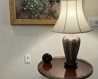 Accent Table With Decorative Lamp and Framed Floral Wall Art