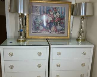 Pair of White ThreeDrawer Nightstands with Lamps and Wall Art