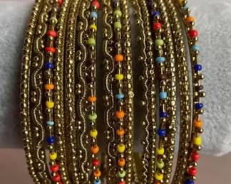Collection Of Multicolored Beaded Bangle Bracelets
