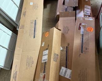 Assorted new window blinds and shades 